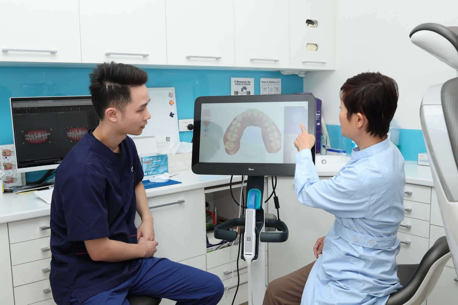 uSmile Dental clinicians reviewing a digital dental scan in the Hurstville surgery